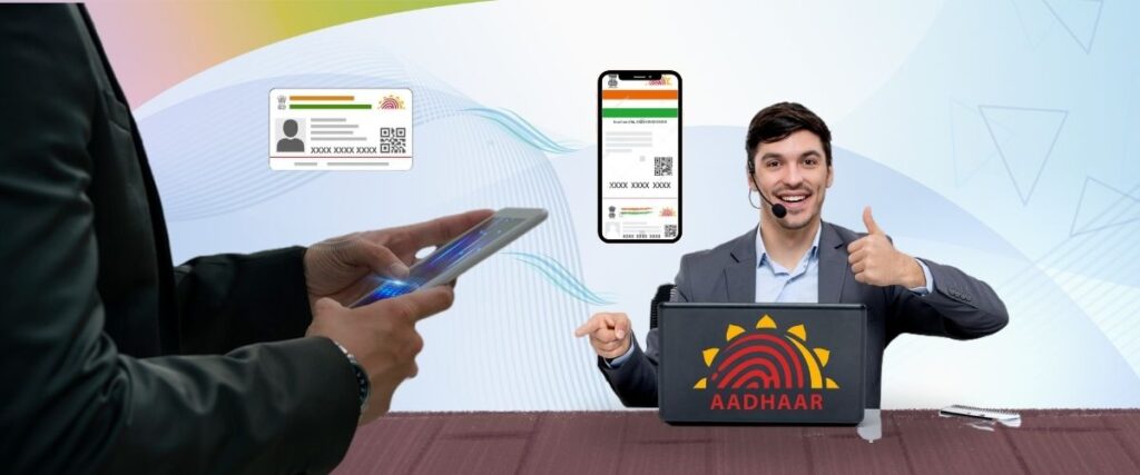 A man with a headset, identified as an Aadhar representative, gives a thumbs-up while a user on the left uses a smartphone to verify their Aadhar details. A digital representation of the Aadhar card is visible, along with a smartphone showing the Aadhar app. The background is a vibrant, abstract illustration of waves and light.