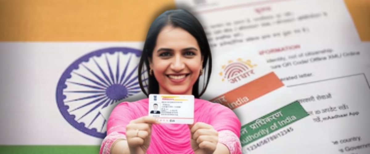 Woman Presenting Aadhaar Card for Update Smiling woman holding an Aadhaar card with an Indian flag and application forms in the background.